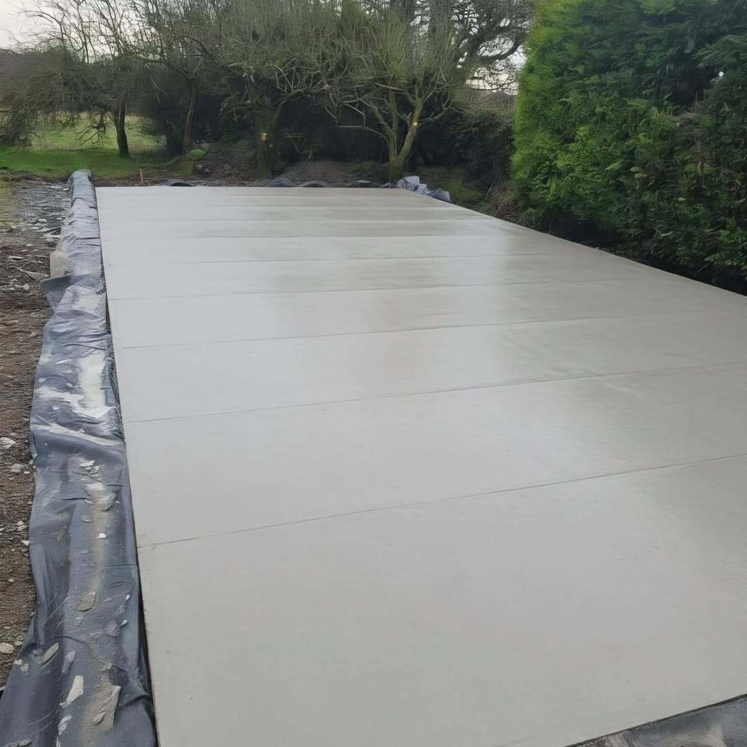 Finished residential concrete slab with a smooth surface finish in Trim