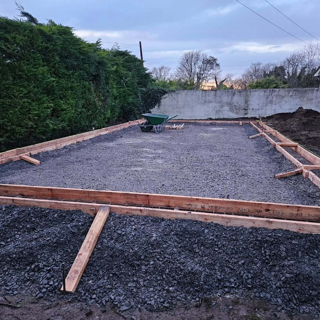Wooden formwork and crushed-stone sub-base prepared for a residential concrete slab in Trim